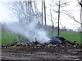 Burning waste on Land Gate Lane in WN4 0BN