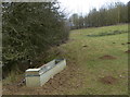 Water trough next to the River Chater in Leighfield