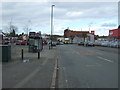 Bus stop and shelter on Holbrook Lane, Holbrooks, Coventry in CV6 4NJ