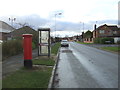 Elizabeth II postbox and telephone box on Camborne Drive, Horeston Grange in CV11 6RN