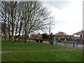 Bus Shelters and Wide Grass Verge on Barnsley Road in DN5 8UF