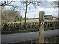 Essex Way logo on a public footpath sign in CM5 9QL