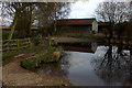 Pond and footbridge, Redbournbury in AL3 6RS