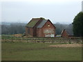 Brick built barns, Burrow Hill Farm in CV7 8BW