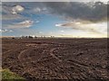 Recently ploughed field overlooking Nigg Bay in IV18 0NF
