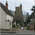 Hundon: signpost and church tower in Hundon