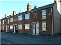 Terraced houses with fancy brickwork, Pen-y-Llan Street in CH5 4WH
