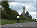 Cyclist on Station Road in NN6 9DA