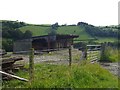 Farm building on the road N of Afon Clywedog in Llanidloes Without Community