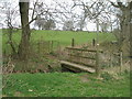Footbridge at the path junction on Carlton Moor in LS19 7ZA