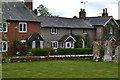 Houses opposite the church, Ropley in SO24 0DP
