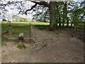 Stile by gate on footpath east of Ockley in RH5 5HY