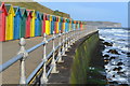 Beach huts on promenade below West Cliff in YO21 3JL