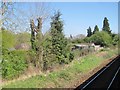 View from a Southampton-Salisbury train - Rural garden sheds in SO51 0JP