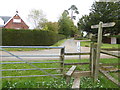 Footpath from Ardingly Road crosses stile and drive at Stonelands in RH19 4QU