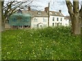 Houses beside North Nibley church in GL11 6DH