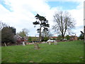 Houses bordering Cawston Churchyard in NR10 4AH