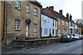 Houses with raised pavement on South Street, Castle Cary in BA7 7ET