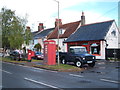 Elizabeth II postbox and telephone box on The Street. Kirby-le-Soken in Kirby-le-Soken & Hamford Ward