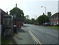 Bus stop and telephone box on Holloway Road in CM9 4LY