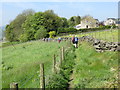 Enclosed footpath being used by a group of walkers near Chiserley in HX7 8RZ