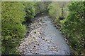 Rhymney River below footbridge, Bargoed Woodland Park in NP12 3SP