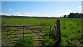 Gate and fields at Stratton Farm, Inverness in IV2 7NH