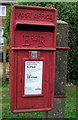 Close up, Elizabeth II postbox on Main Road, Crimplesham in PE33 9FD