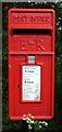 Close up, Elizabeth II postbox on Hall Moor Road, Hingham in NR9 4LB