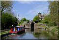 Narrowboat entering Botterham Locks near Swindon, Staffordshire in DY3 4LW