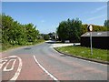 Road entering Brimfield in SY8 4NG