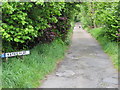 Yates Flat road and footpath linking Gaisby with Wrose in Bradford in BD9 4JB