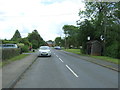 Bus stop and shelter on Mill Road, Tye Green in CB10 2XF