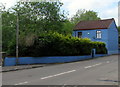 Blue wall and house, Dukestown Road, Tredegar in NP22 4EF