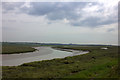 Salt marsh channel with Southend in the distance in SS8 8HN