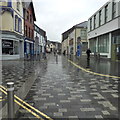 Merthyr Tydfil High Street on a wet Saturday in CF48 1DH