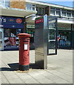 Elizabeth II postbox and telephone kiosk on Southfields, Letchworth in SG6 4LZ