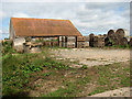 Farm shed and old straw bales on Matlaske Road near Saxthorpe in NR11 6QS