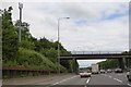 Phone mast and Lye Lane bridge over M25 in St. Stephen