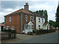 Houses on Pages Lane, Saham Toney in IP25 7EL