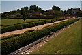 Clipped box hedge in the Roman Palace garden, Fishbourne in PO18 8AN