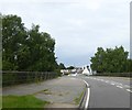 An extremely wide pavement on bridge over A120 in CO7 7SB
