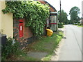 Elizabeth II postbox and telephone box on Bell Lane, Saham Toney in IP25 7HA