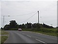 Bus stop and pull-off on B1027 west of Clacton-on-Sea in CO16 8BN