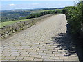 The cobbled Heath House Lane at Bolster Moor in HD7 4JW