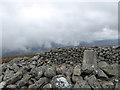 Summit shelter and trig point on Geallaig in AB35 5UJ