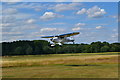 Light aircraft coming in to land at Brimpton Airfield in RG7 4LZ