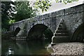 Bridge crossing the River Ogmore at Pen y Fai in CF31 4LY