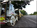 Road works vehicles at a bus stop on the A37, looking north in BS39 4JF