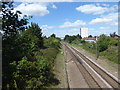 View of the railway from Brick Lane bridge in EN1 3PE